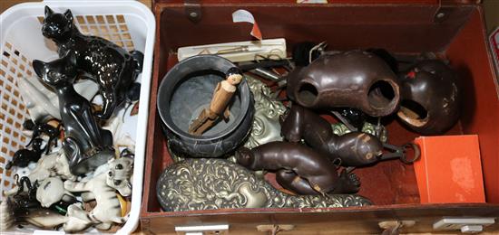 Mixed collectables in suitcase